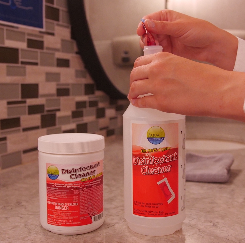 Aqua ChemPacs disinfectant cleaner in the restroom 2
